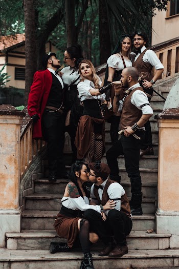People Standing And Sitting On Stairs