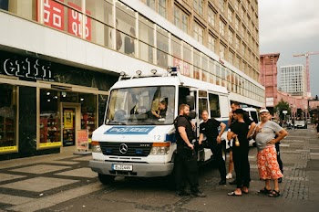 People Standing Beside Mercedes-benz Van