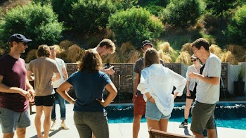 People Standing Beside Pool