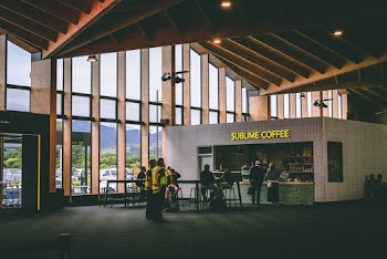 People Standing in Front of Sublime Coffee Store