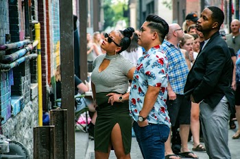 People Standing in Front of the Building