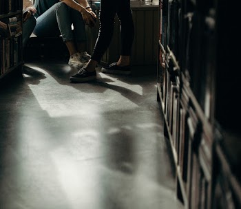 People Standing in Library