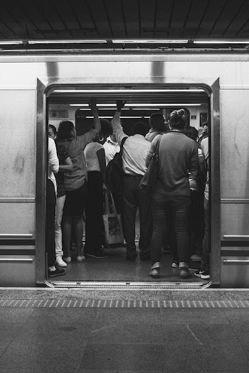 People Standing Inside Train