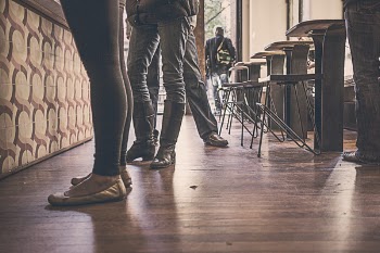People Standing Near Table