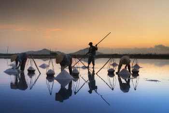 People Standing On Body Of Water