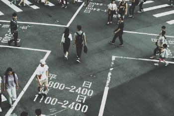 People Standing on Road Close-up Photography