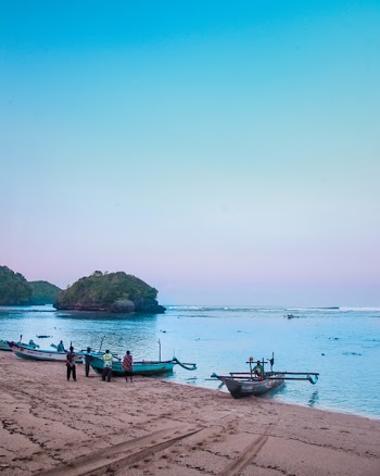 People Standing on Shore
