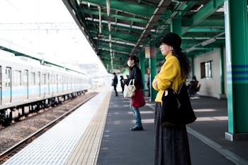 People Standing on Train Station