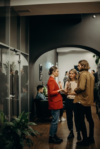 People Talking in Well-lit Room