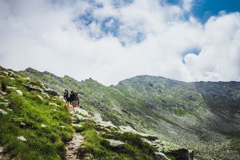 People Trekking in The Mountain