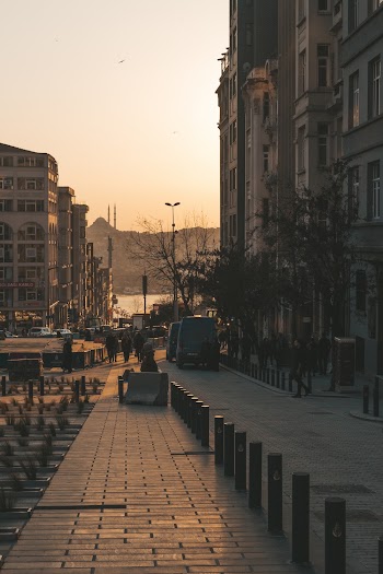 People Waking Beside Building