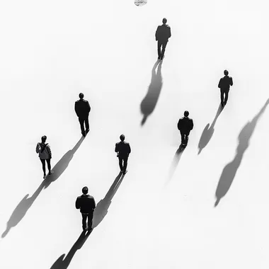 People Walking Across Snowy Field: Minimalist Black Silhouettes, Top-Down View