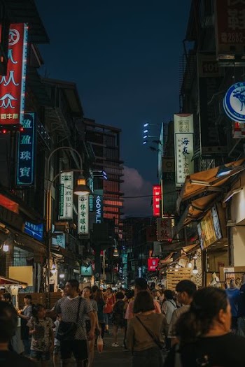 people walking along alley road