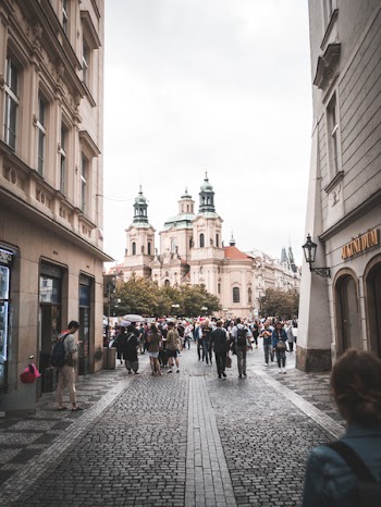 People Walking Along Streets 