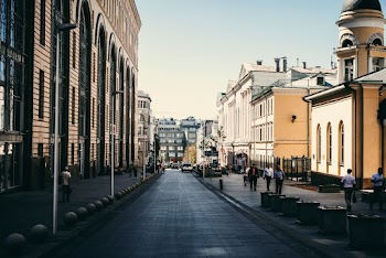 People Walking Beside Buildings
