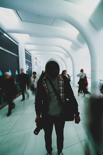 People Walking in Building Lobby