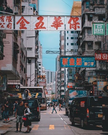 people walking in street during daty