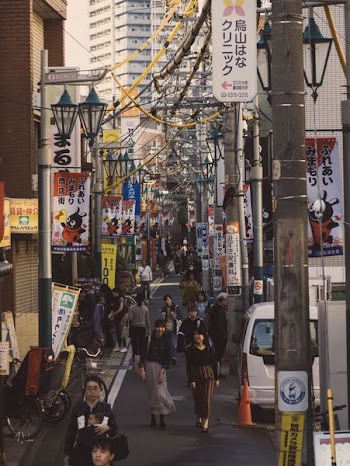 people walking in the street at daytime
