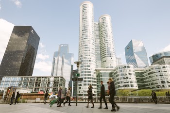 People Walking Near High Rise Buildings