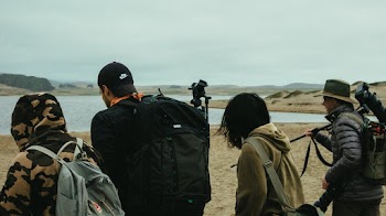 People Walking Near River