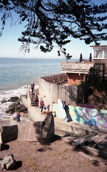 People Walking Near Side Of Building