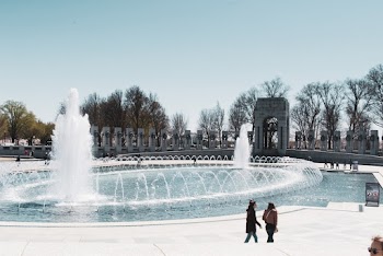 People Walking Near Water Fountain