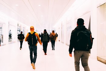 People Walking On A Hallway