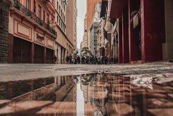 People Walking On Alley