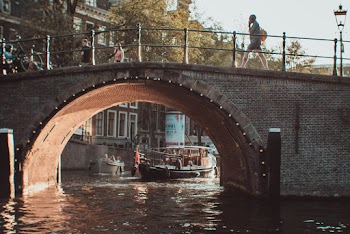 People Walking on Bridge