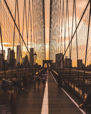 People Walking on Bridge