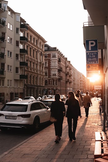 People Walking on Sidewalk