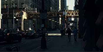 People Walking On Sidewalks