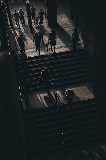 People Walking On Stairs