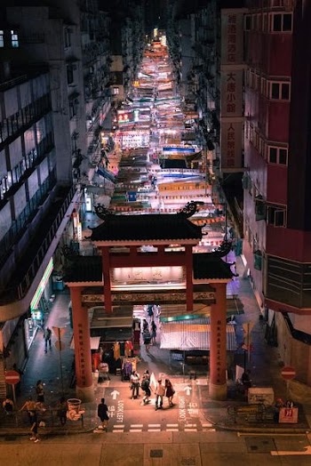 people walking on the middle of street