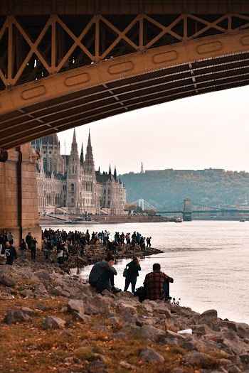 People Watching At The Riverside