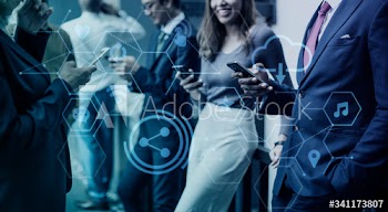 People with phones in a business meeting