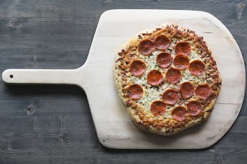 Pepperoni Pizza On Wood Board