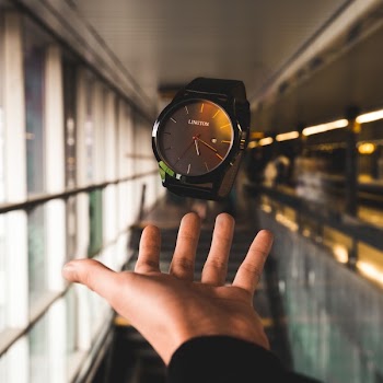Person's Hand Below Watch