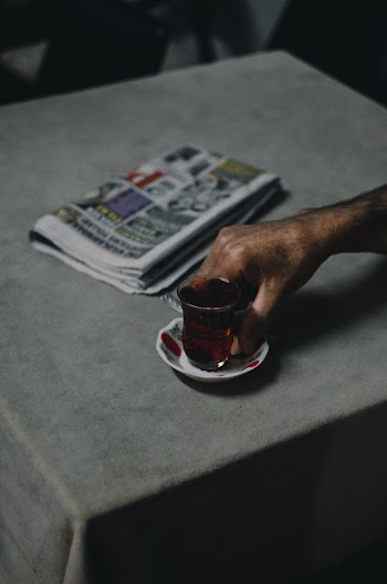 Person's Hand on Table