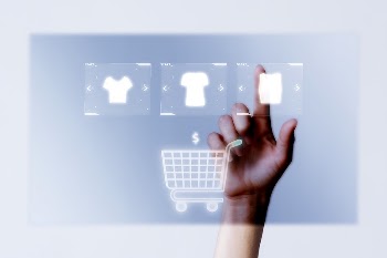 Person adding clothes psd to cart | Free PSD - rawpixel