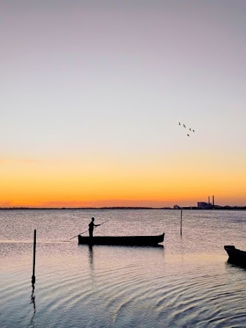 Person Boating during Golden Hour