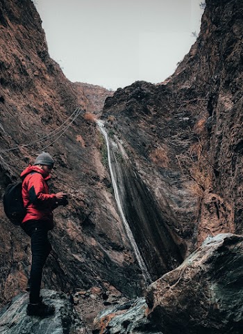 Person By The Cliff