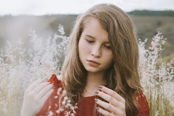Person By The Grass