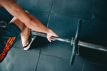 Person Carrying Barbell