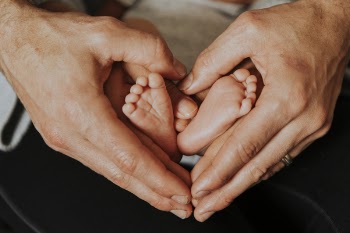 Person Carrying Infant