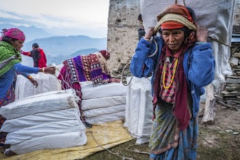 Person carrying Lokta bark paper | Free Photo - rawpixel