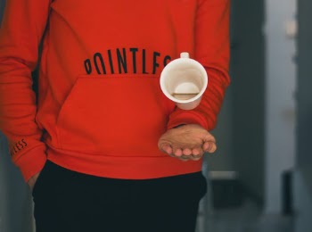 Person Catching White Mug