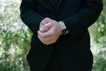 Person Clasping Both Hands
