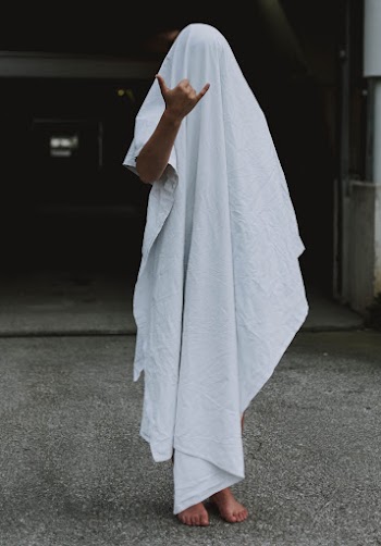 Person Covered with White Towel Close-up Photography