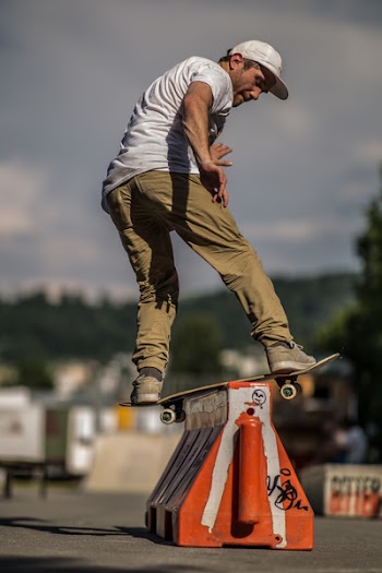 Person Doing Trick on Skateboard